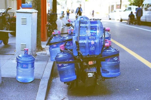 Water can delivery